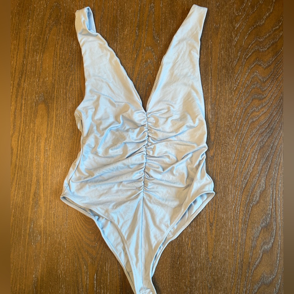 Zara Blue Bodysuit One Piece with Classic Silhouette